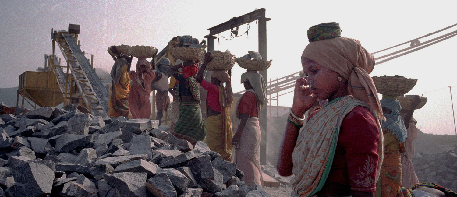 business-Girl-Takes-A-Break-From-Carrying-Rocks-At-A-Gravel-Quarry-edited-compressor