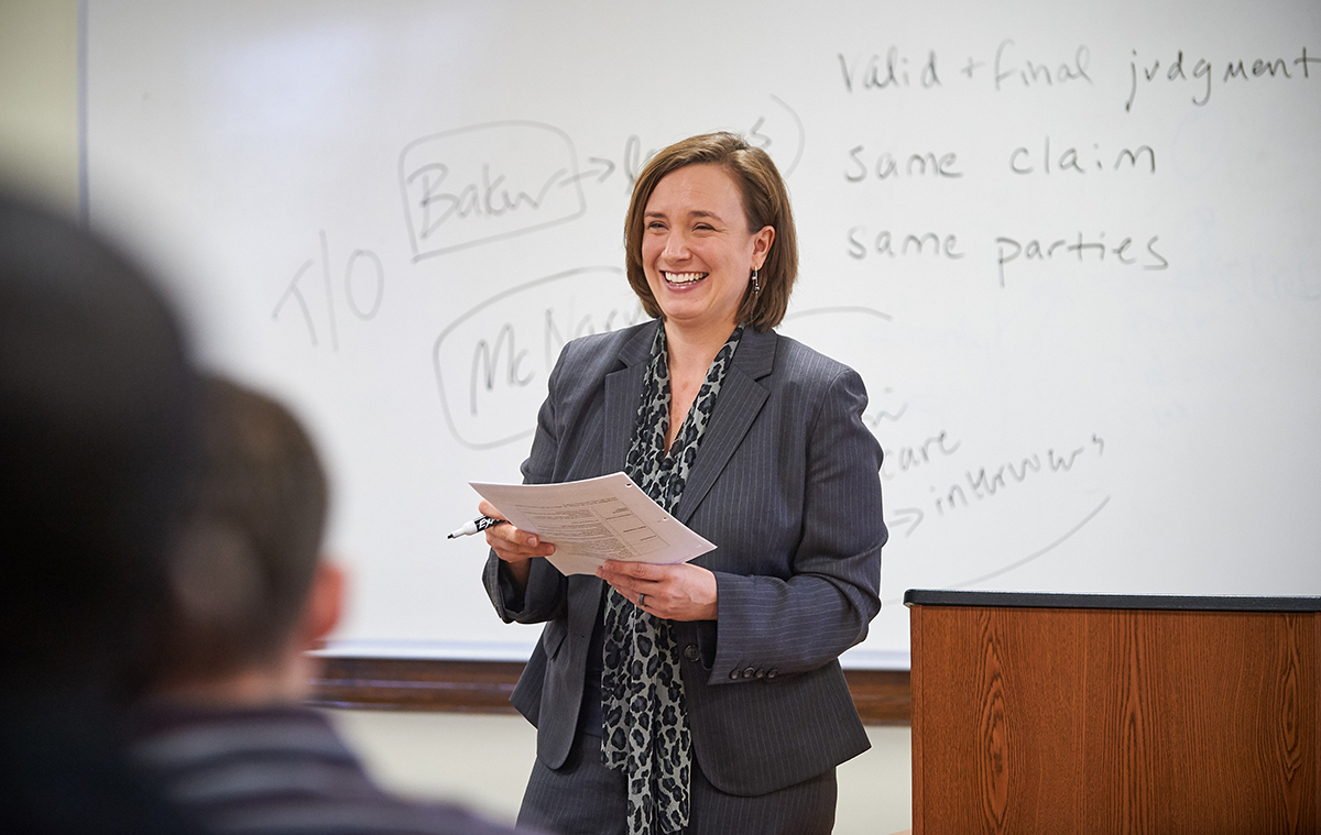Molly Land teaches a class